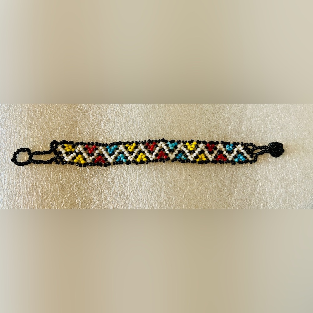 Hand beaded bracelet with vibrant colors and design